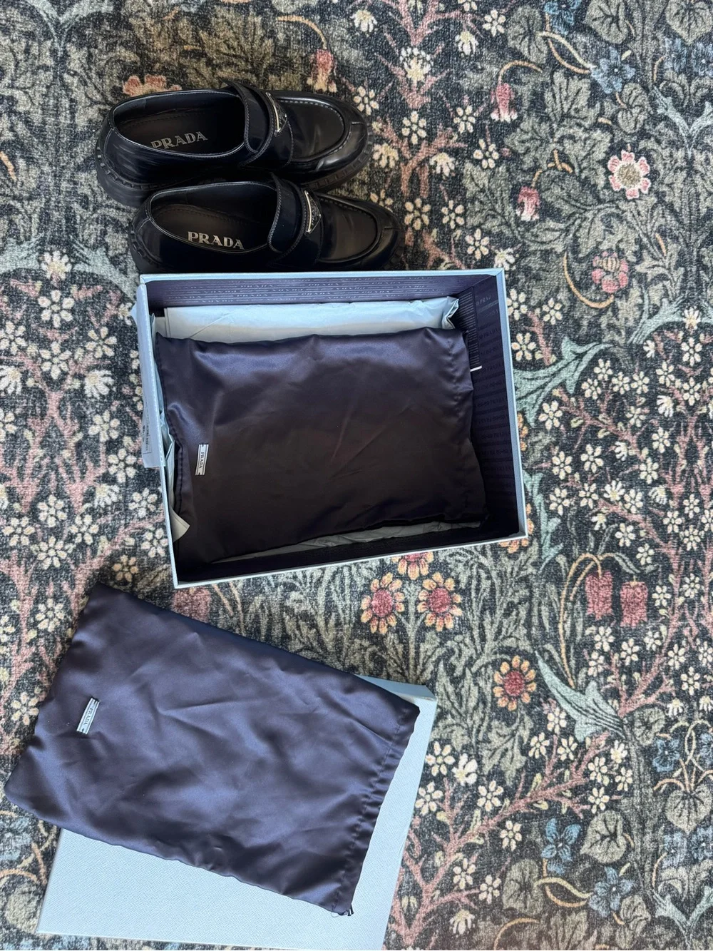 Prada Black Leather Penny Loafers with Triangular Logo